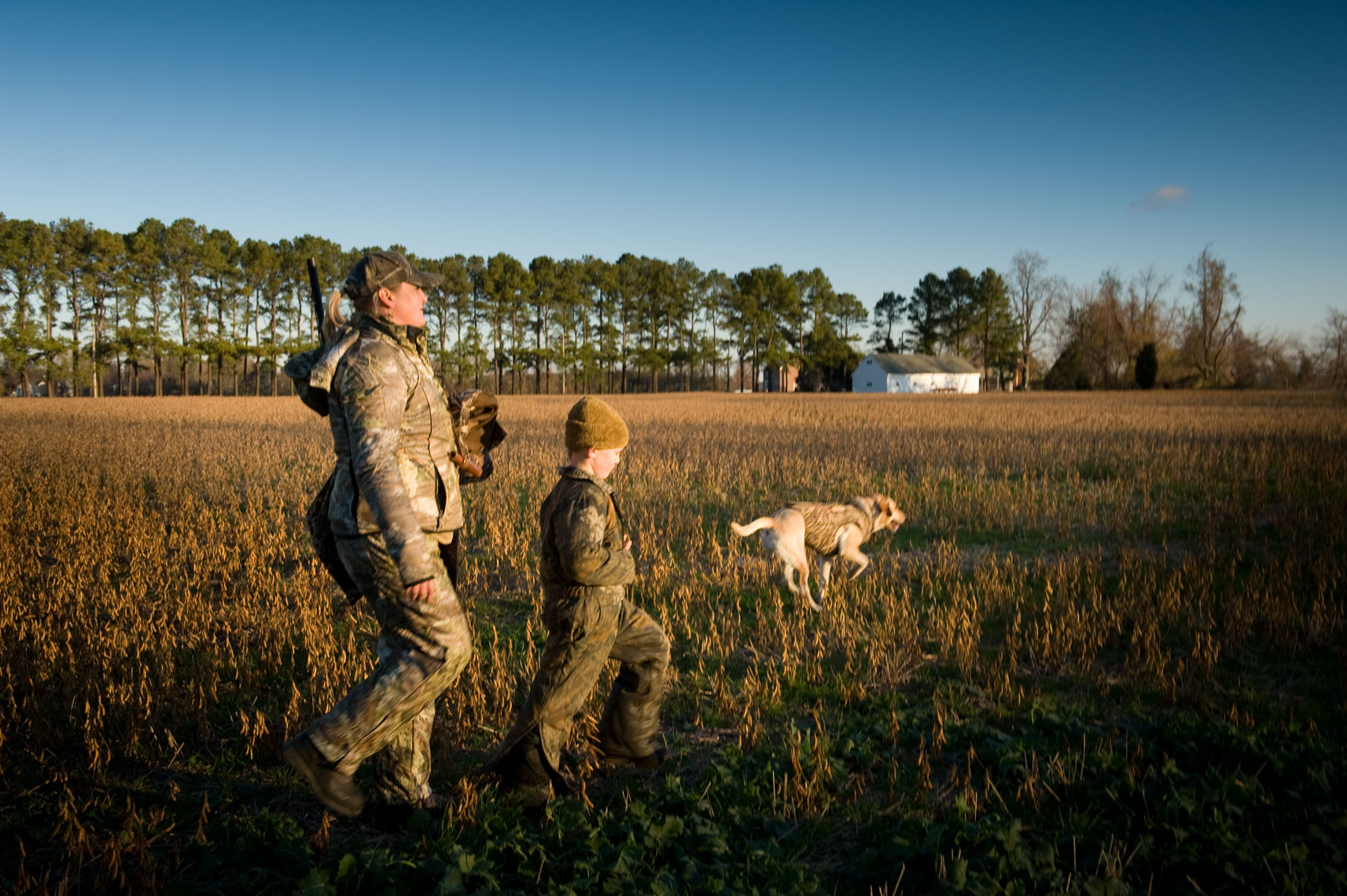 Hunting for waterfowl on the Eastern Shore of Maryland: a mother and son headed out to hunt at sunrise