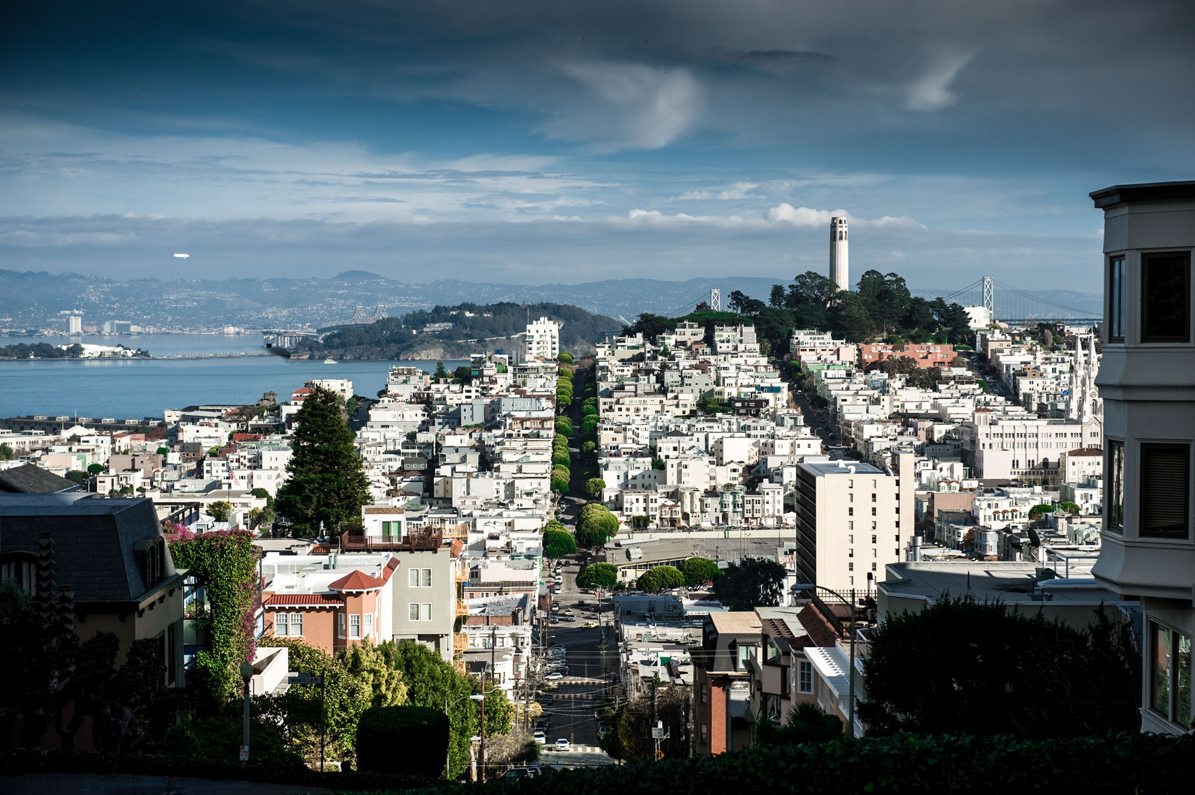View of Coit Tower from atop Lombard Street in San Francisco, California