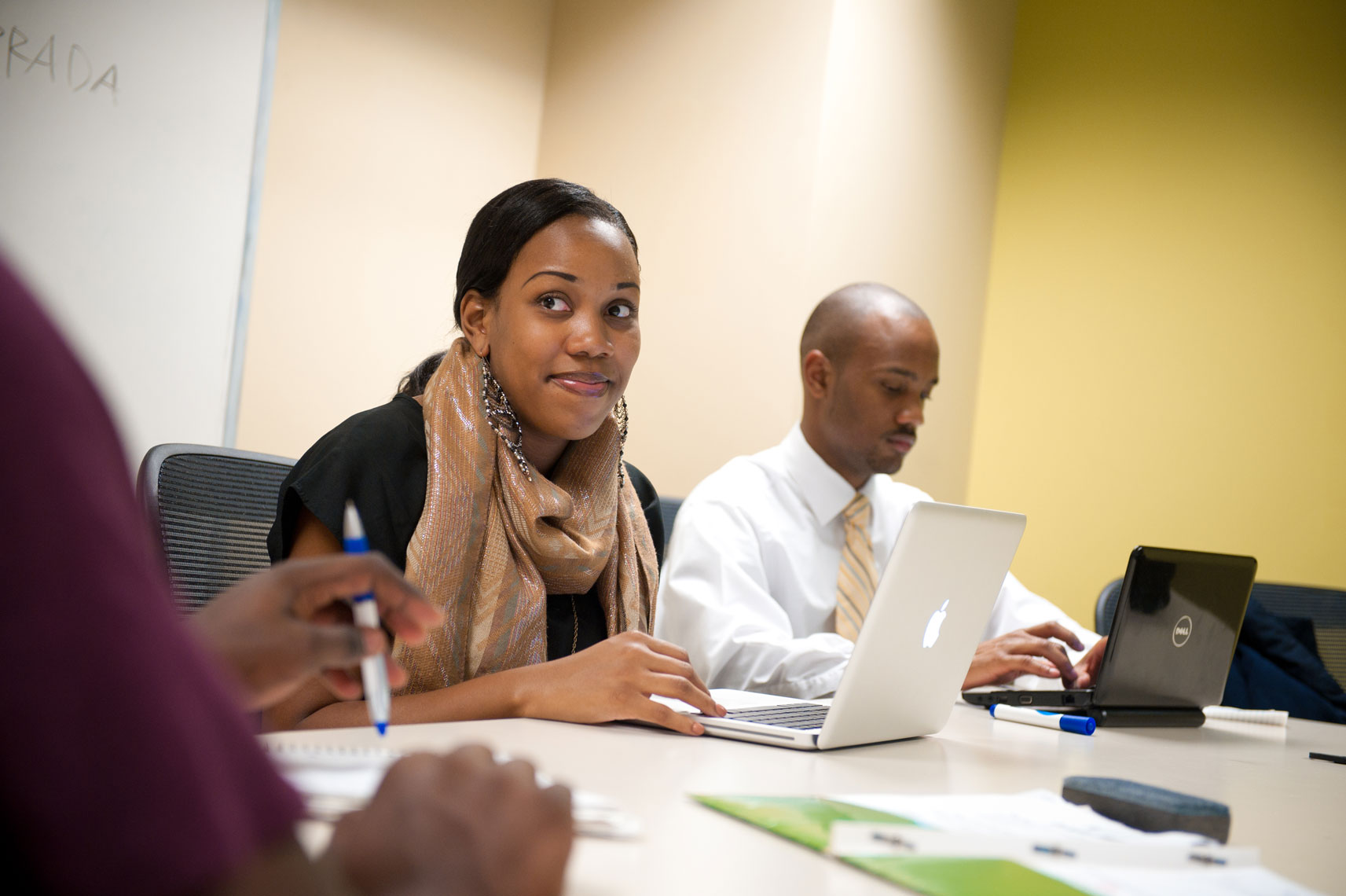 College students working together in a room at the library