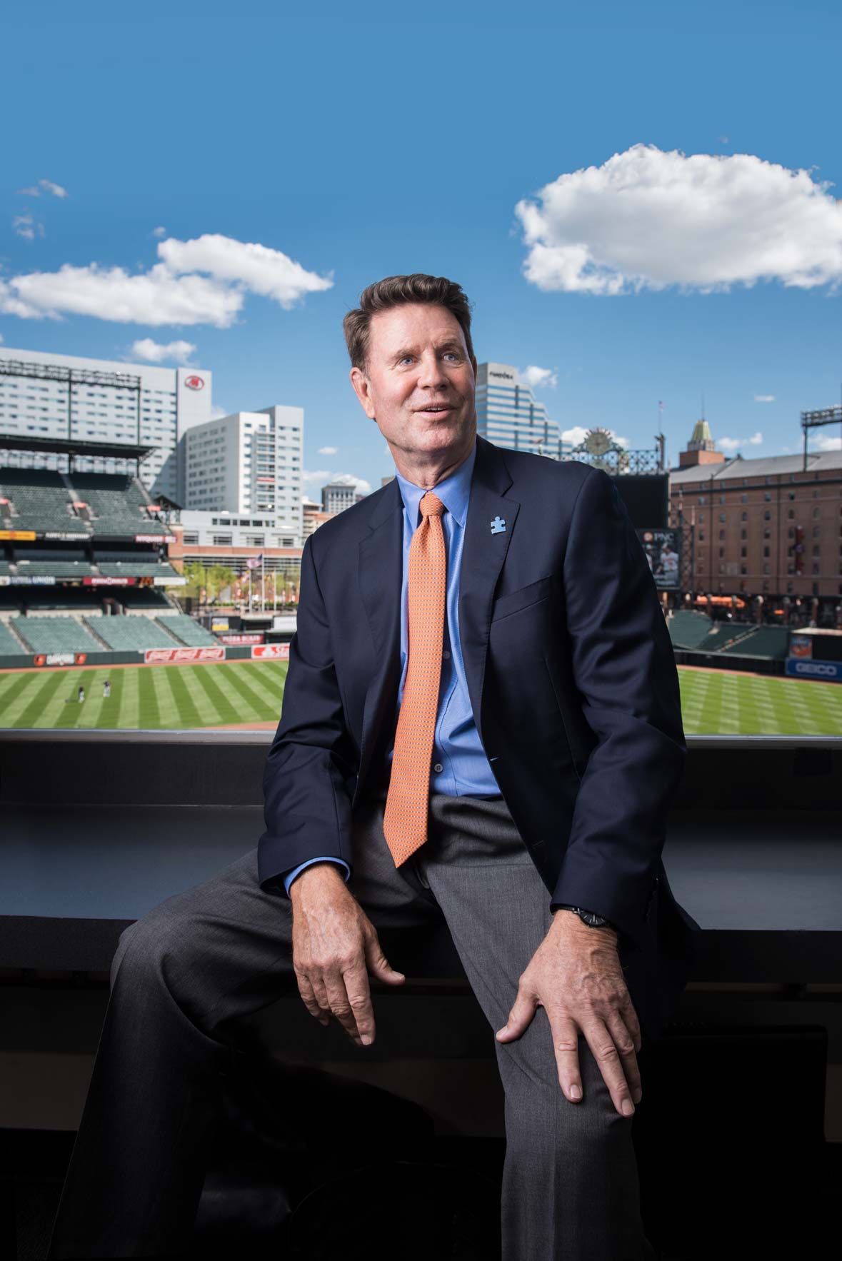 Orioles broadcaster Jim Palmer in the booth with Camden Yards in the background