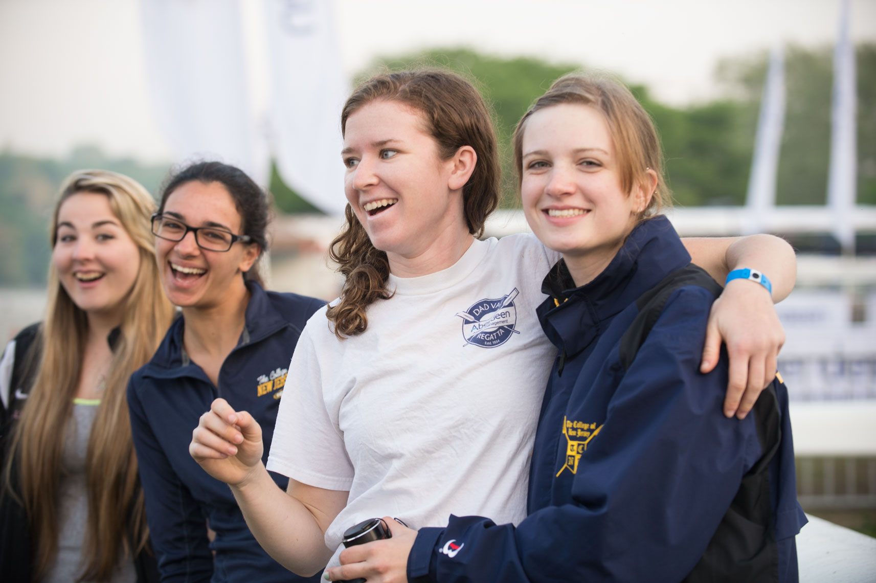 Team members of the TCNJ crew team smiling and having fun