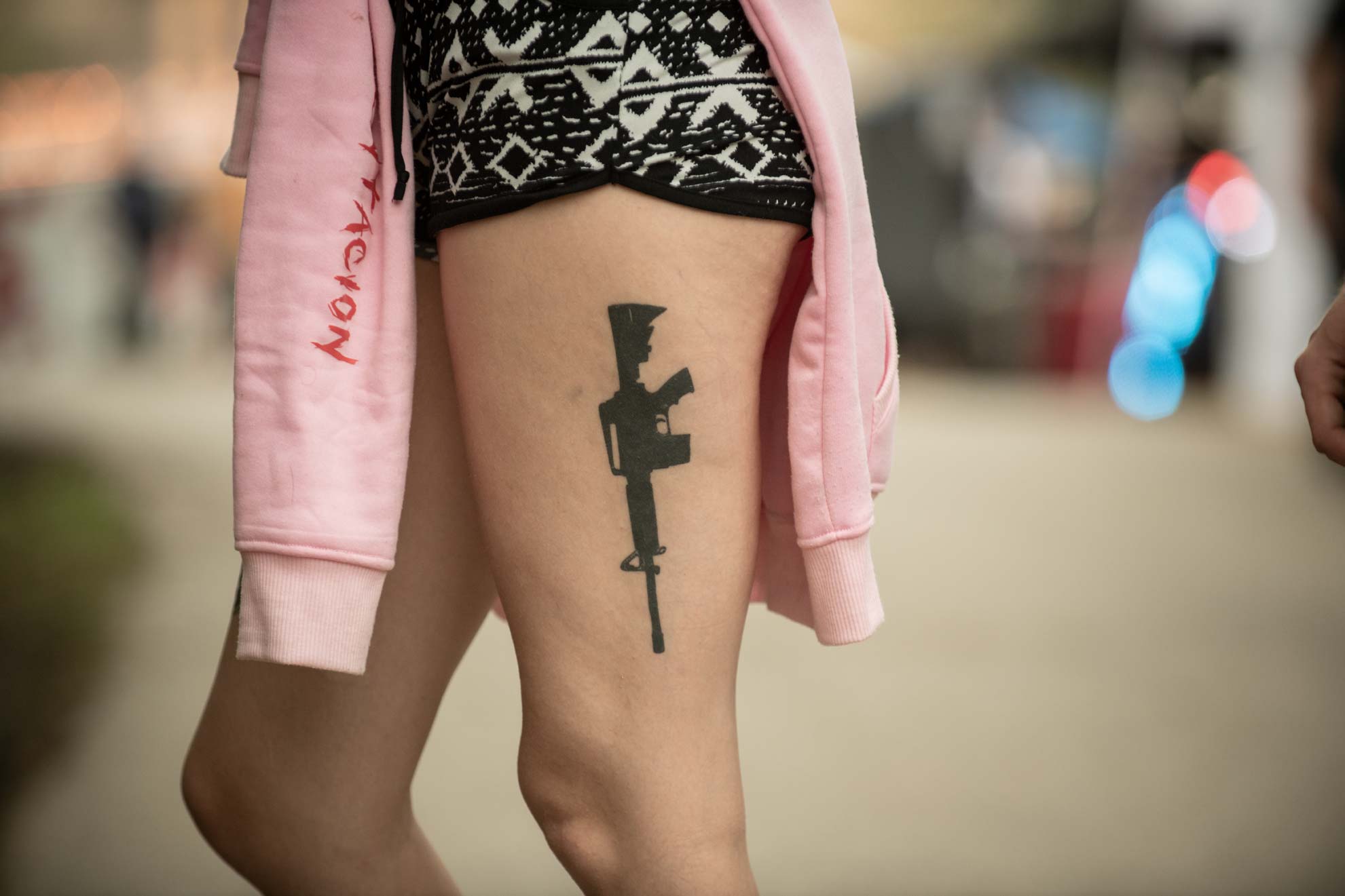 National Trailfest: An AR-15 rifle tattoo on a woman