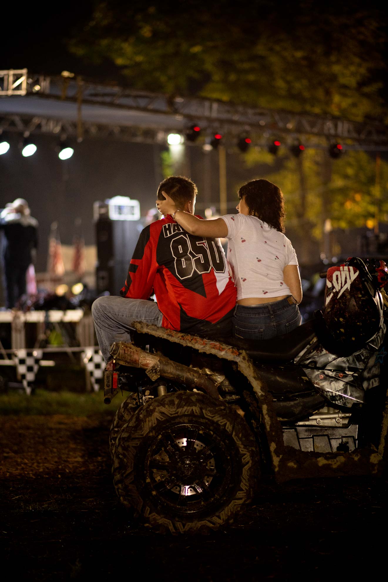National Trailfest: Two festival goers share a romantic moment as they watch festivities from an ATV