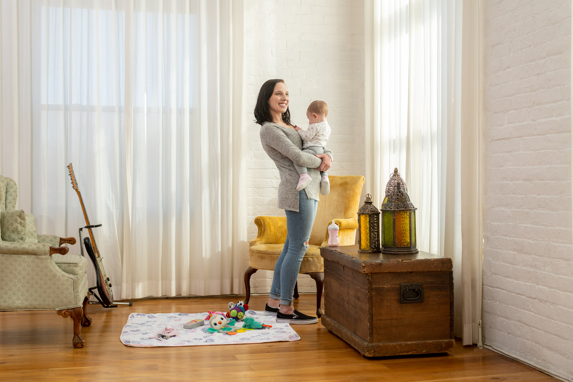 Mother and infant daughter standing in a living room for the Indivior annual report